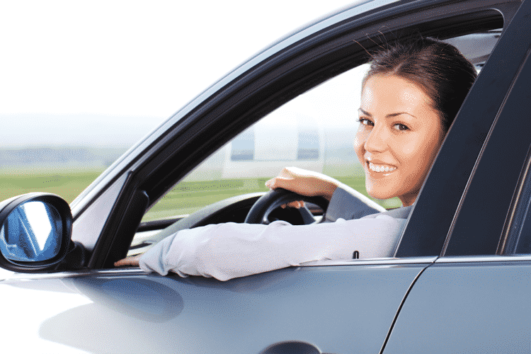 Car Insurance - Women smiling throguh driver side window